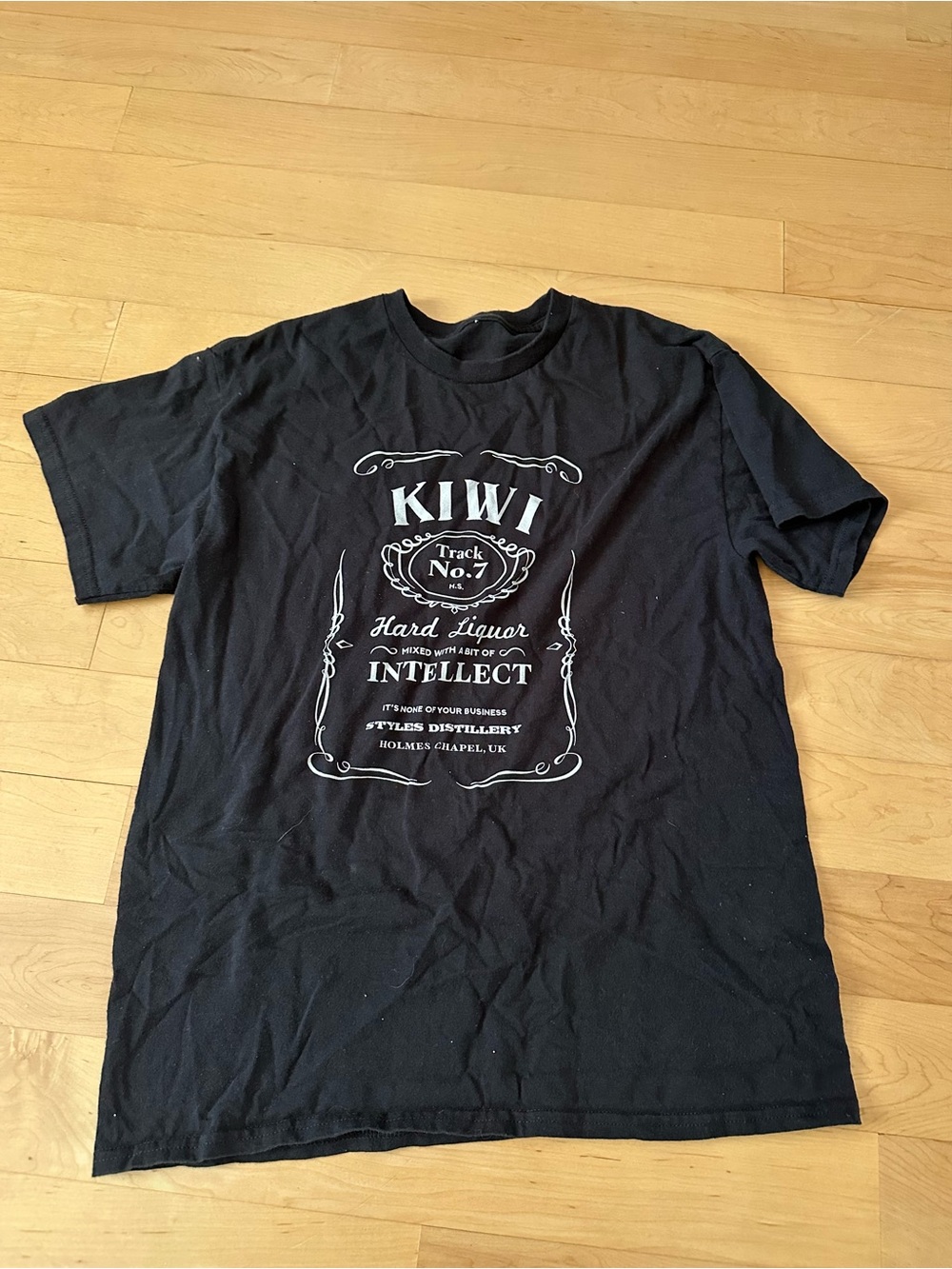 Kiwi Black Short-Sleeve Graphic Tee with White Print